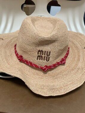 Miu Miu Women's Elegant Beige Straw Hat with Striking Red Bow
